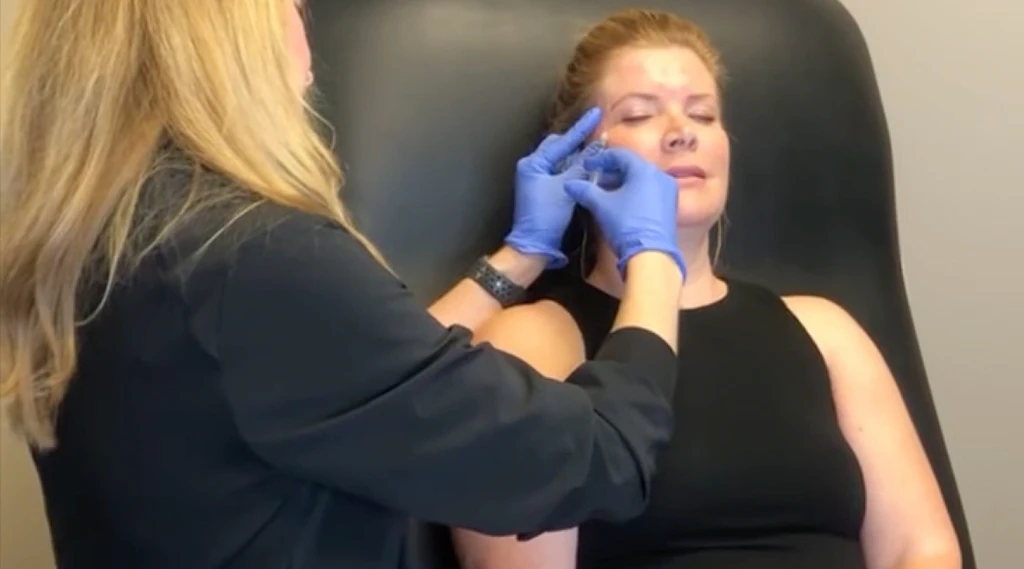 woman getting a facial injectable treatment