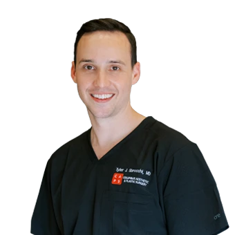 Dr. Tyler Sbrocchi in a scrubs