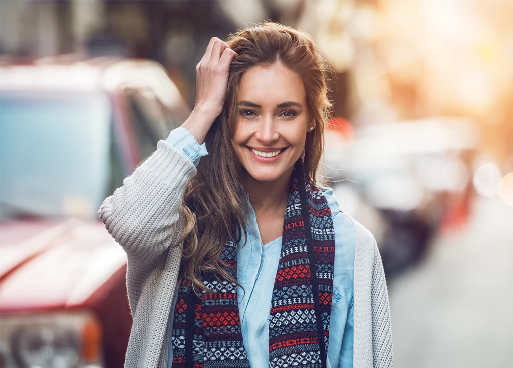 Woman in scarf on busy street