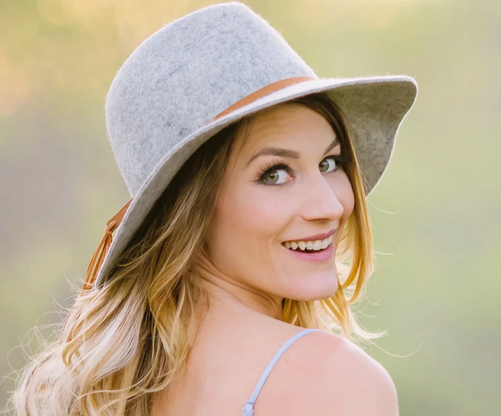 Woman smiling in hat